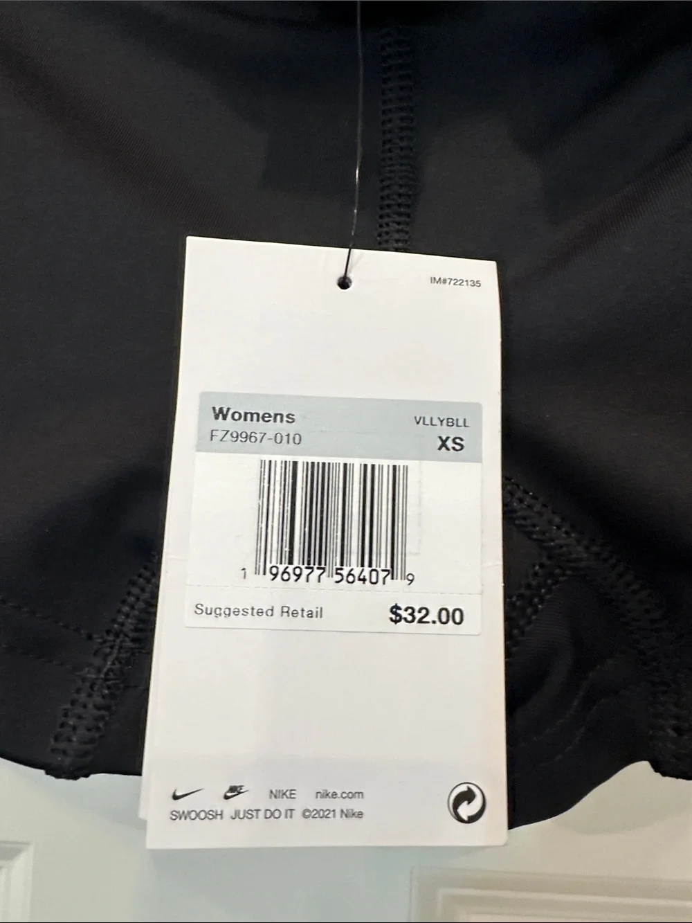 Nike Women's Black Athletic Shorts with White Swoosh Accent